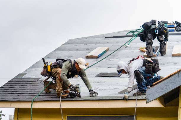 Professional Roofing technician working in West Camp, NY
